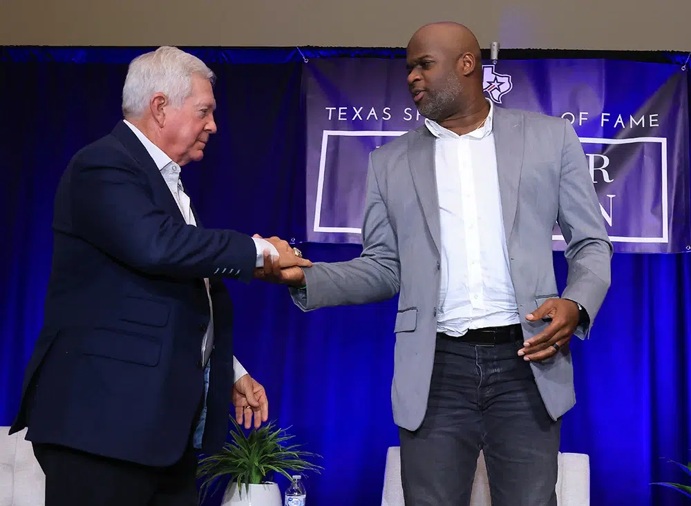 mack brown and vince young shake hands