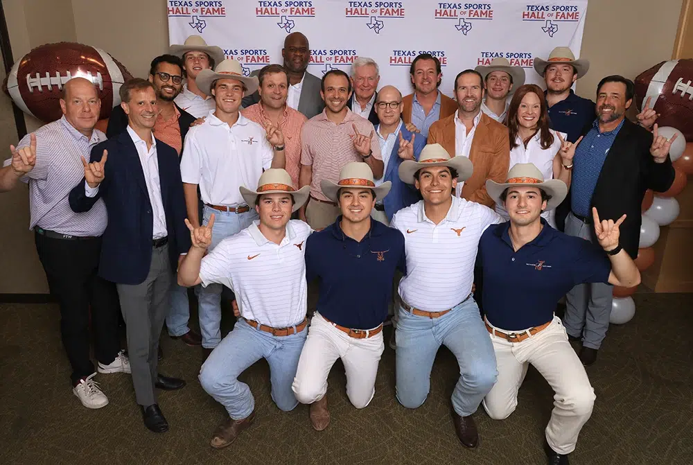 mack brown and vince young group photo