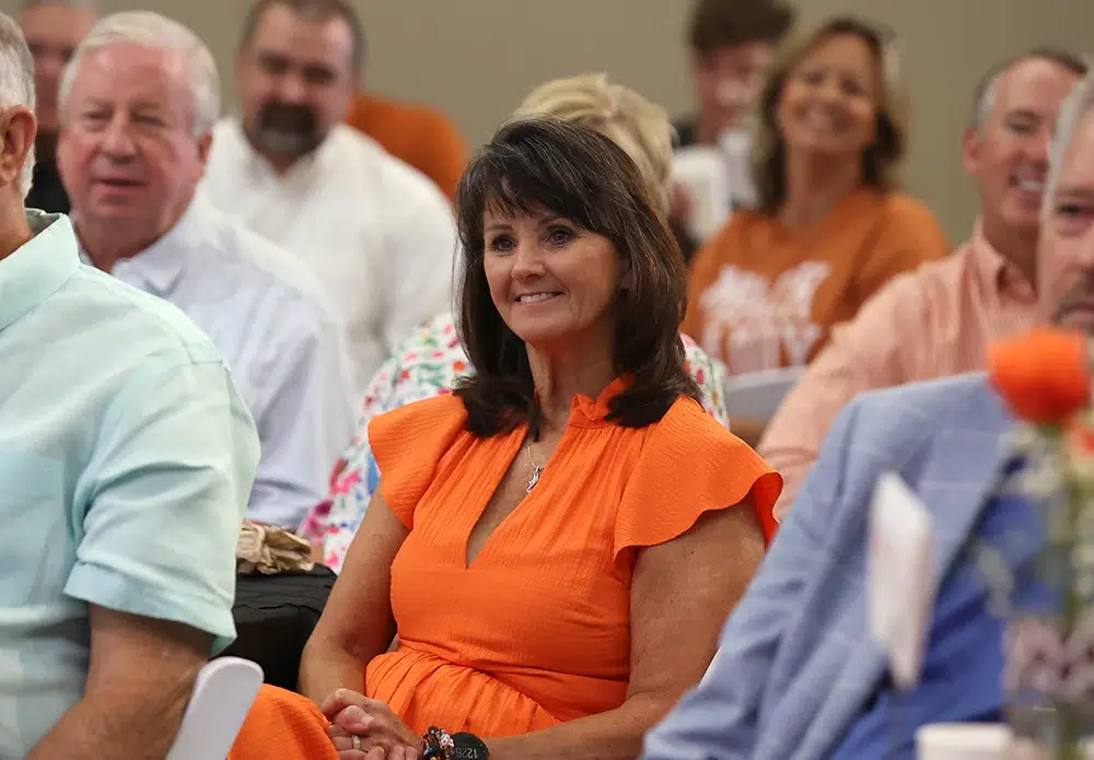 lady in orange dress