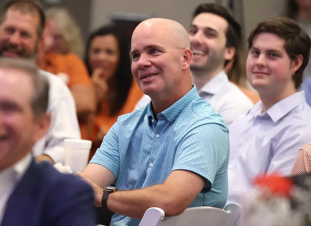 man in a light blue shirt
