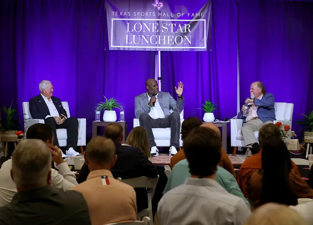 mack brown together with vince young and ed clements