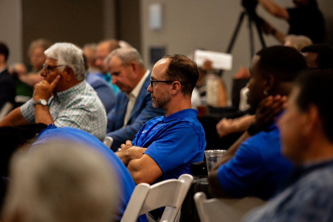 man wearing blue shirt